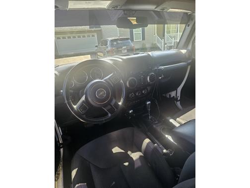 White 2015 Jeep Wrangler Unlimited Sport