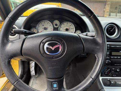 Yellow 2002 Mazda MX-5 Miata LS