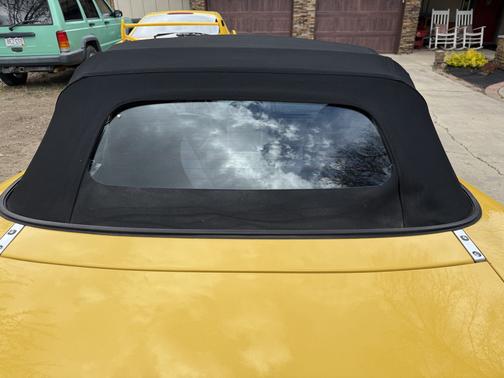 Yellow 2002 Mazda MX-5 Miata LS