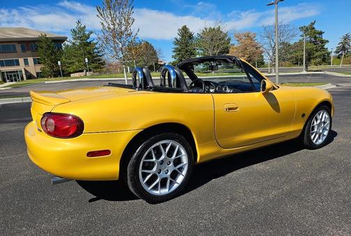 Yellow 2002 Mazda MX-5 Miata LS