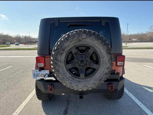 Red 2008 Jeep Wrangler Unlimited Sahara