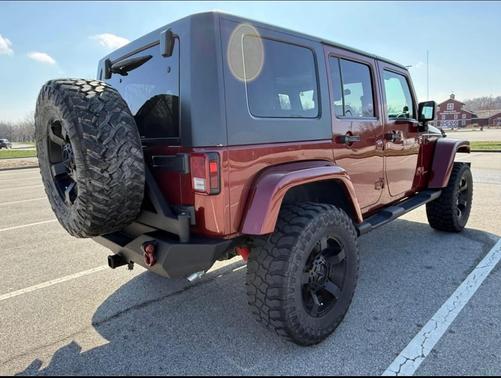 Red 2008 Jeep Wrangler Unlimited Sahara