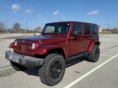 Red 2008 Jeep Wrangler Unlimited Sahara