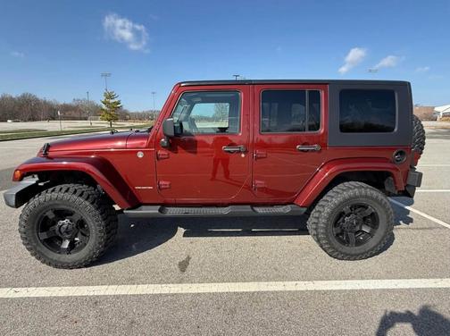 Red 2008 Jeep Wrangler Unlimited Sahara