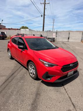 Red 2024 Subaru Impreza Base