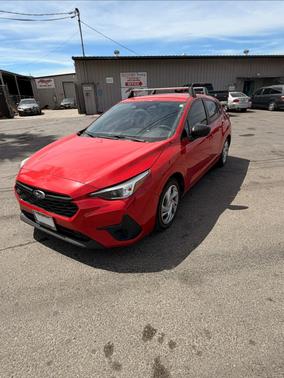 Red 2024 Subaru Impreza Base