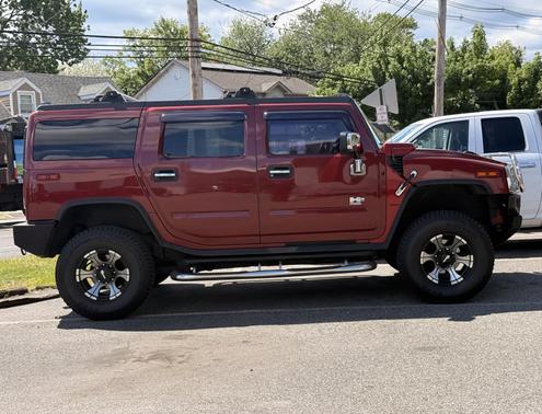 Red 2004 Hummer H2 Base