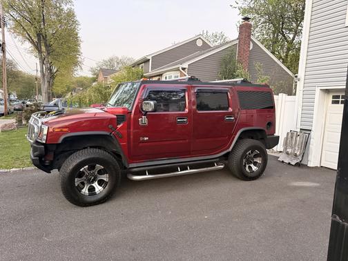 Red 2004 Hummer H2 Base