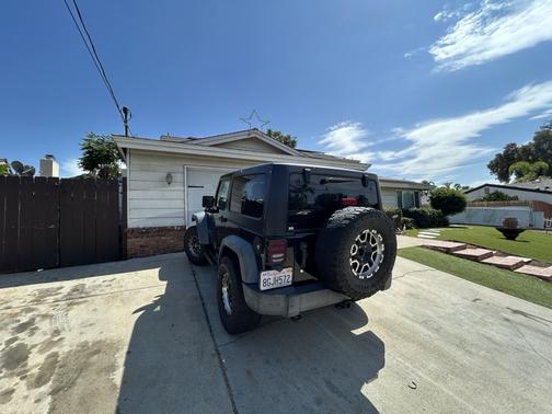 Black 2012 Jeep Wrangler Sport