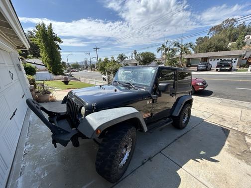 Black 2012 Jeep Wrangler Sport