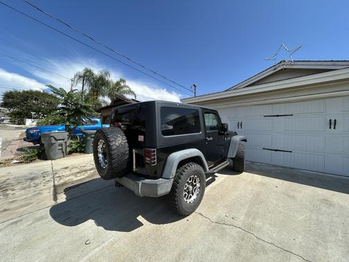 Black 2012 Jeep Wrangler Sport