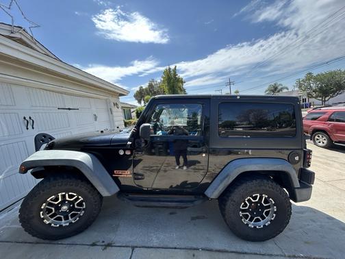 Black 2012 Jeep Wrangler Sport