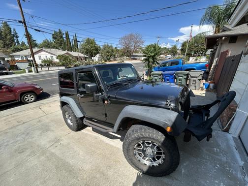 Black 2012 Jeep Wrangler Sport