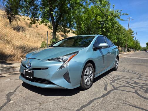 Green 2018 Toyota Prius Three