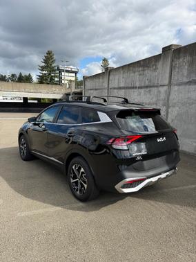 Black 2025 Kia Sportage Hybrid EX