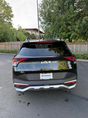 Black 2025 Kia Sportage Hybrid EX