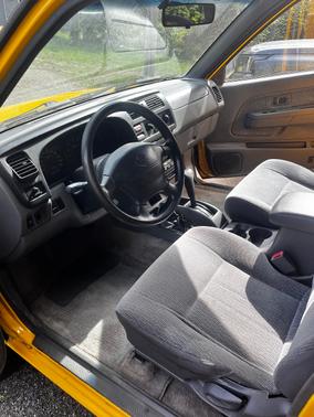Yellow 2000 Nissan Frontier XE Crew Cab