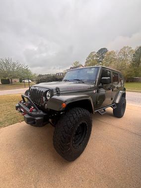 Green 2015 Jeep Wrangler Unlimited Rubicon