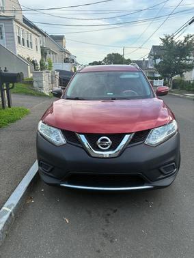Red 2015 Nissan Rogue SV