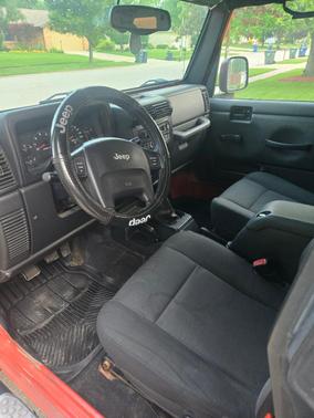Orange 2006 Jeep Wrangler Sport