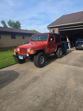 Orange 2006 Jeep Wrangler Sport
