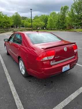 Red 2010 Mercury Milan Base