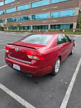 Red 2010 Mercury Milan Base