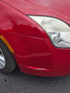 Red 2010 Mercury Milan Base