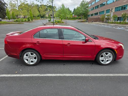 Red 2010 Mercury Milan Base