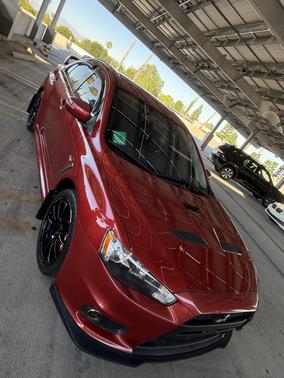 Red 2015 Mitsubishi Lancer Evolution GSR