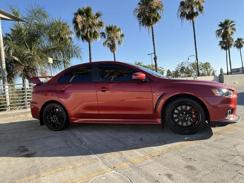 Red 2015 Mitsubishi Lancer Evolution GSR