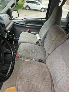 Black 1999 Ford F-350 Lariat SuperCab Super Duty