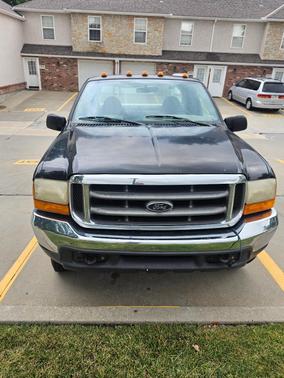 Black 1999 Ford F-350 Lariat SuperCab Super Duty
