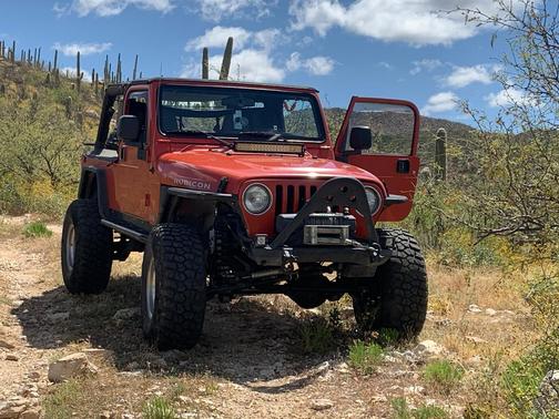 Orange 2005 Jeep Wrangler Unlimited Rubicon