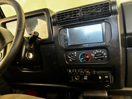 Orange 2005 Jeep Wrangler Unlimited Rubicon