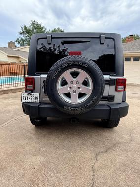 Silver 2015 Jeep Wrangler Unlimited Sport