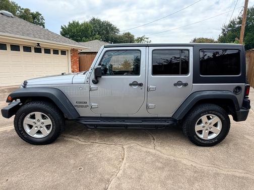 Silver 2015 Jeep Wrangler Unlimited Sport