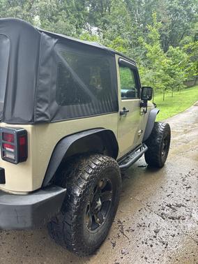 Beige 2011 Jeep Wrangler Sport