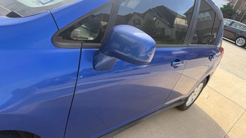 Blue 2009 Nissan Versa 1.8 SL