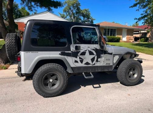 Silver 2004 Jeep Wrangler Sport