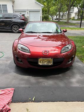 Red 2010 Mazda MX-5 Miata Sport