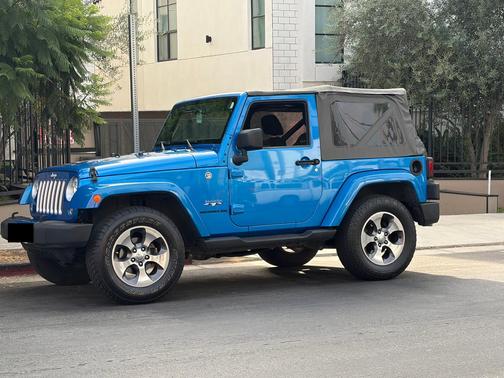 Blue 2016 Jeep Wrangler Sahara