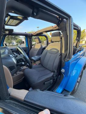 Blue 2016 Jeep Wrangler Sahara