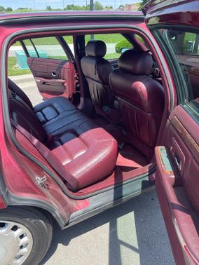 Red 1998 Cadillac DeVille Base