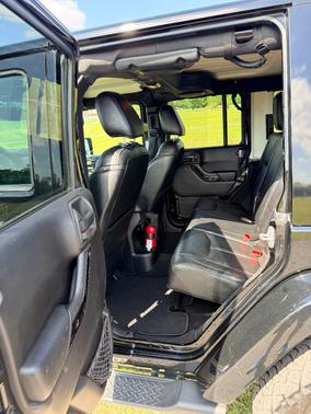 Black 2014 Jeep Wrangler Unlimited Altitude