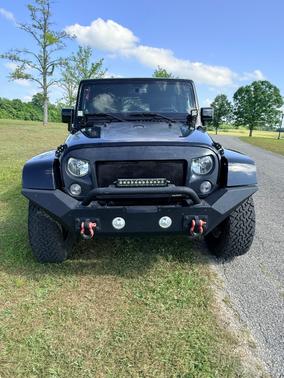 Black 2014 Jeep Wrangler Unlimited Altitude