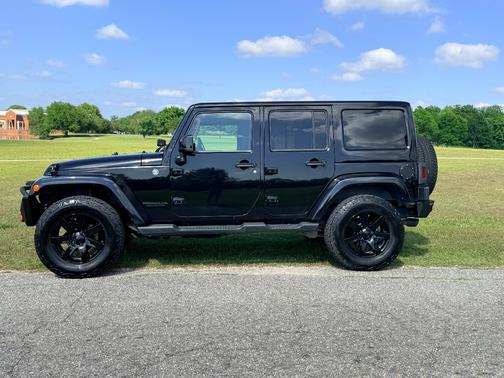 Black 2014 Jeep Wrangler Unlimited Altitude