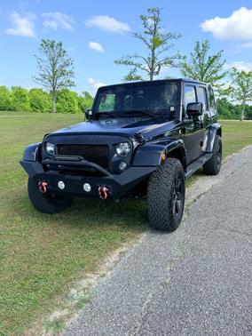 Black 2014 Jeep Wrangler Unlimited Altitude