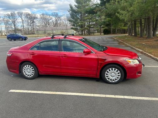 Red 2010 Toyota Camry LE