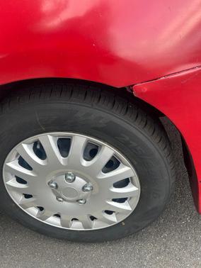 Red 2010 Toyota Camry LE